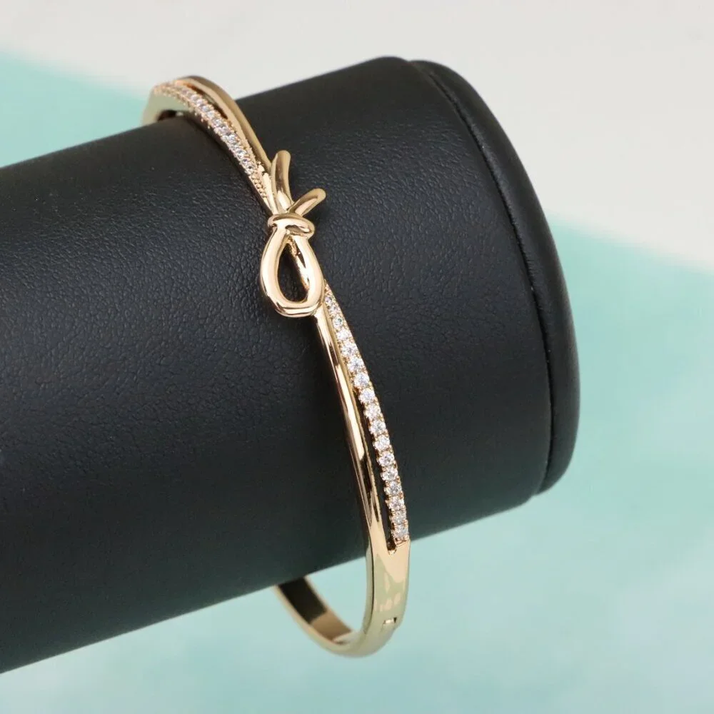 Rose Gold Bow Knot Bangle with Sparkling CZ Accents, XPBL0427